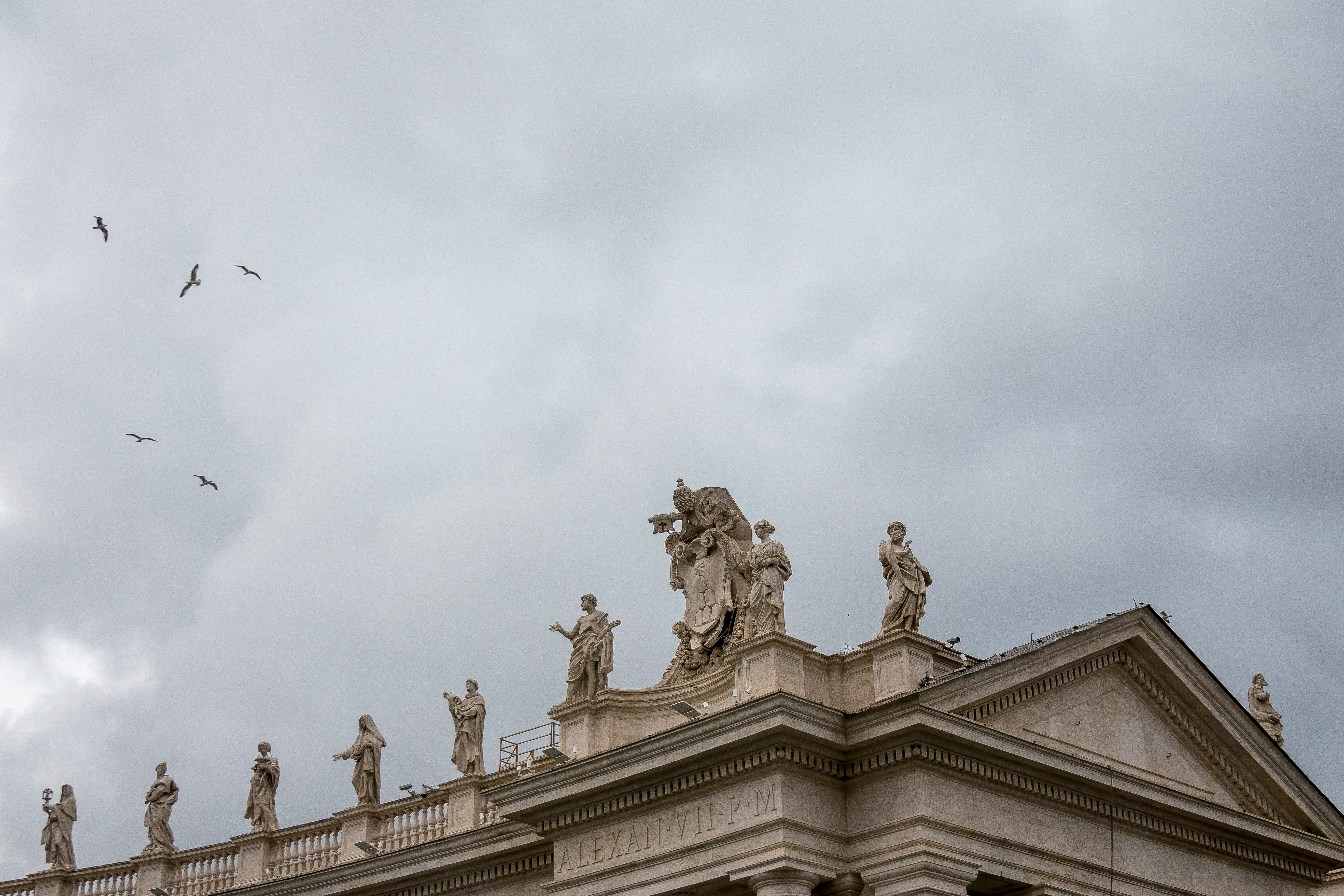 white concrete building under white sky during daytime